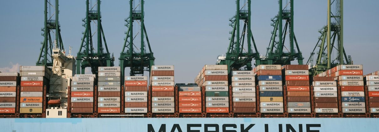 cargo ship on body of water during daytime